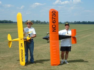 Merrit and Lubo with their oversized toys...